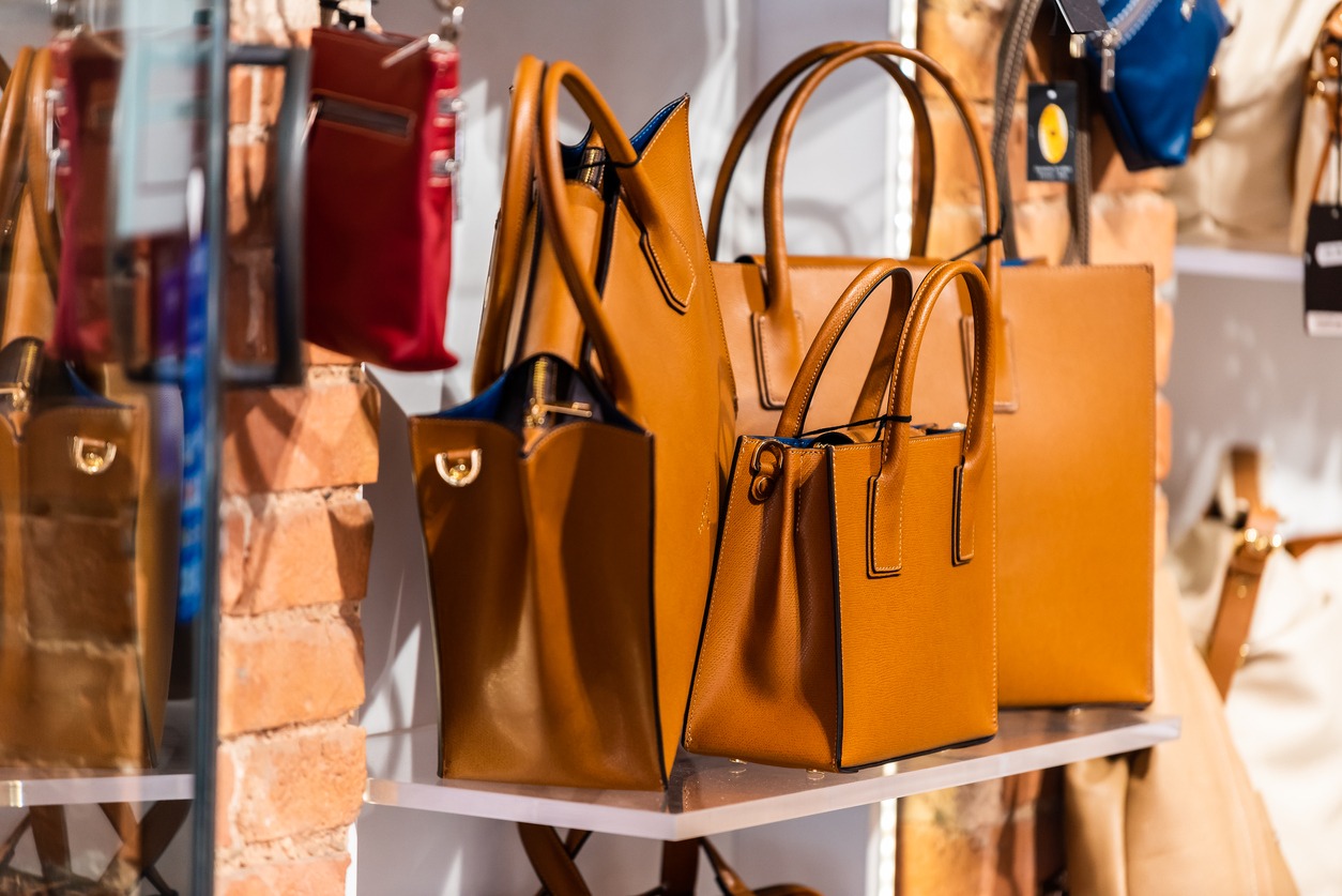 leather handbags on a table